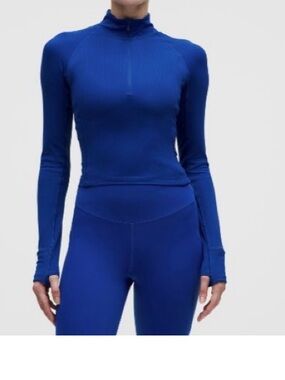 Lululemon it’s rulu half zip waist length size large (fits an 8 IMO)